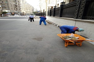 حملة نظافة بشوارع الحي