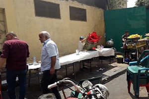 حملة لرفع الإشغالات من شوارع الحي