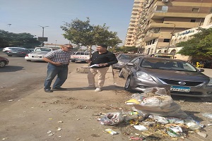 رئيس الحي يتفقد حالة النظافه بالشوارع
