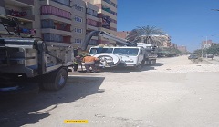 حملة لتطهير بالوعات الأمطار ببعض شوارع الحي