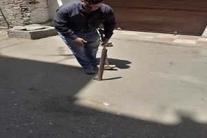 استعادة المظهر الحضاري لشوارع الحي