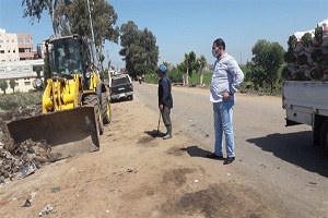 تكثيف أعمال النظافة اليومية بشوارع حي المعادي