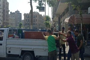 حملة لرفع الإشغالات بشارع التحرير