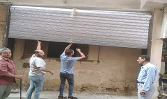 وقف اعمال مخالفة بدون ترخيص بشارع تل الحصن