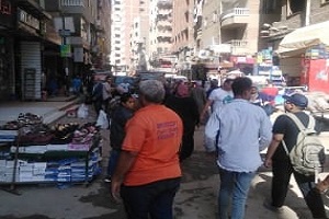 حملة لرفع الإشغالات والباعه الجائلين بالحي