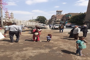 حملة لرفع الاشغالات بالحي  