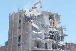 إزالة عقار مخالف بشارع مدرسة البيان بحي السلام أول