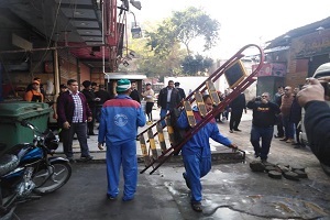 رفع الاشغالات وإيداعها بمخزن الحي  