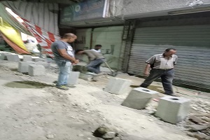 إستمراريه متابعة أعمال تطوير الرصف والإنارة بنطاق الحي