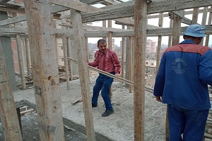 إزالة للمباني المخالفة بعقار بشارع الريس على حسن بحي روض الفرج