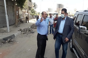 تنفيذ خطة تطوير شوارع الحي  