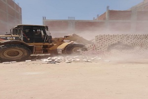 إزالة التعديات على أراضي أملاك الدولة بحي طره