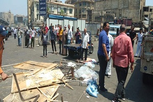 حملة لرفع الإشغالات من شوارع الحي