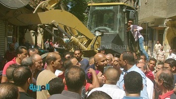 إزالة أعمال بناء مخالفة بحي الخليفة