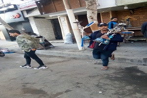 رفع الإشغالات المخالفة من المقاهي والمحلات