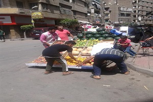 حملة لرفع الإشغالات بالحي