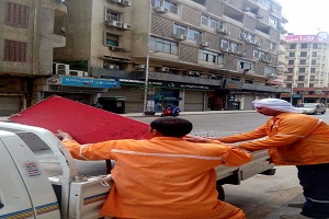 رفع إشغالات محل بشارع طلعت حرب