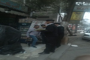 حمله لرفع الإشغالات ببعض شوارع الحي