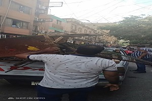 حملة لإزالة الاشغالات والتجاوزات بشوارع حي الأزبكية