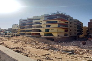 حملات لإزالة العقارات لتوسعة الطريق الدائري بالحي