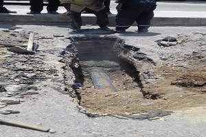 إصلاح هبوط أرضي بشارع اليوناني