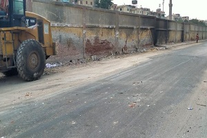 استعادة المظهر الحضاري لشوارع الحي