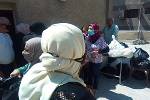 توزيع شنط مواد غذائيه وتموينية  على عدد 50 اسرة