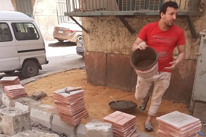 اعمال رصف وتركيب بلاط لبعض شوارع حي روض الفرج